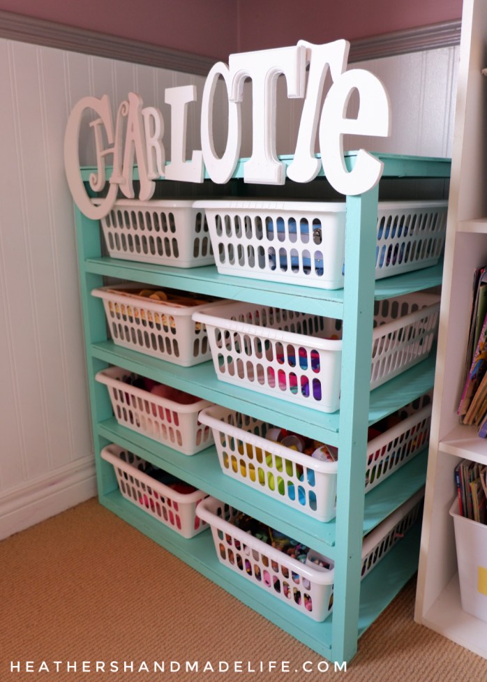 Kids need bins for all their crap! How I used scrap wood and Dollar Store bins to organize my daughter's precious junk {Heather's Handmade Life}